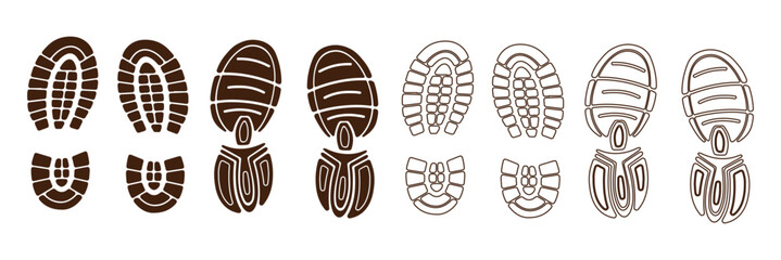 Collection of Black Footprints and Shoe Prints on White Background