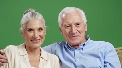Senior couple embracing with love and joy on green screen - perfect for heartfelt family stories, retirement planning, and intergenerational connection videos