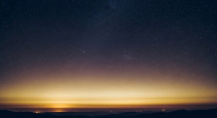 Obraz premium Cosmic glow over distant mountain range in a vast, ethereal panorama