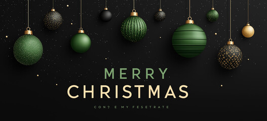 Merry christmas message with hanging ornaments on a dark background