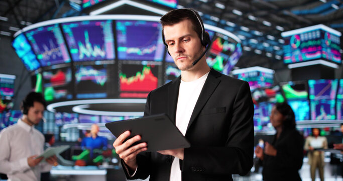 Diverse Group Of Fintech Workers Analyzing Global Stock Market