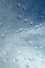 Vertical Glass with Water Drops Texture Background. High-resolution vertical texture of glass with water drops. Perfect for backgrounds, overlays, weather effects, and creative design projects.