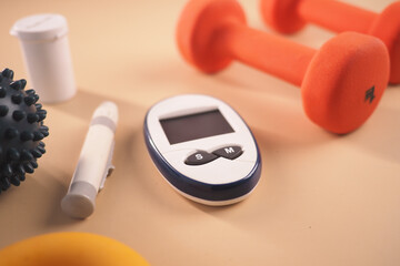 Fitness tools and diabetes monitoring devices on table