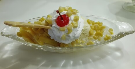 Decadent Banana Split Delight: A classic banana split, artfully presented, tantalizes the senses with its vibrant medley of flavors and textures, a sweet indulgence captured in vivid detail.