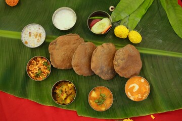 Navratri Upwas Thali  Fasting food platter on banana leaf background