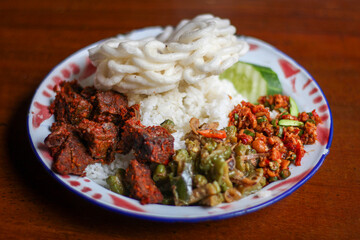 Nasi liwet Khas Sunda. Sundanese aromatic rice. rice with spices, and sundanese traditional cuisine.