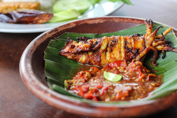 cumi bakar sambal. grilled squid with chili sambal.