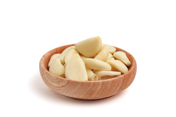 Peeled garlic isolated on white background.