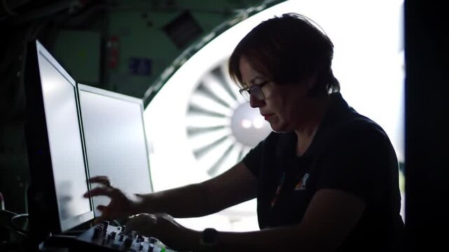 Aerospace Engineer Conducts Critical Aircraft Testing Inside Airplane Cabin Environment