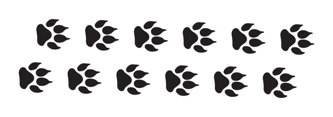 Seamless vector pattern of diverse animal paw prints, including dog, cat, and bear footprints, in a black silhouette design