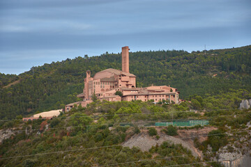 Exterior view of the Sanctuary of Our Lady of the Angels in Torreciudad, surrounded by nature in Huesca, Aragon, Spain