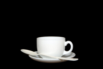 Coffee cup isolated on black background closeup view 