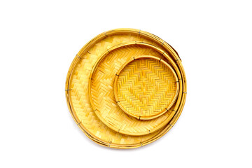 Traditional round woven tray used for drying food.