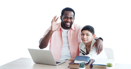 African American man is teacher or tutor teaching with laptop for Caucasian student boy or pupils in classroom at school. Education and technology for online internet concept