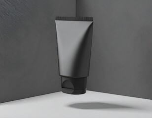 Black tube cosmetic product displayed on a grey background