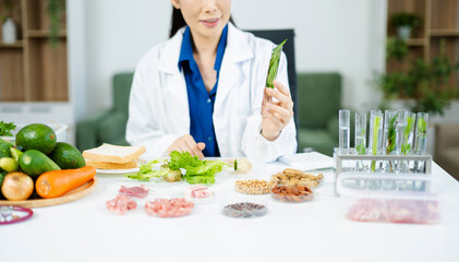 Scientist in a modern lab analyzing food samples with advanced equipment. Perfect for food science, research in  in food science and biotechnology