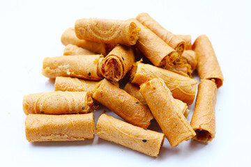 Rolled crispy wafers filled with shredded pork floss, Thai snack.