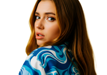 Beautiful young woman with long brown hair looking over her shoulder, a close up portrait