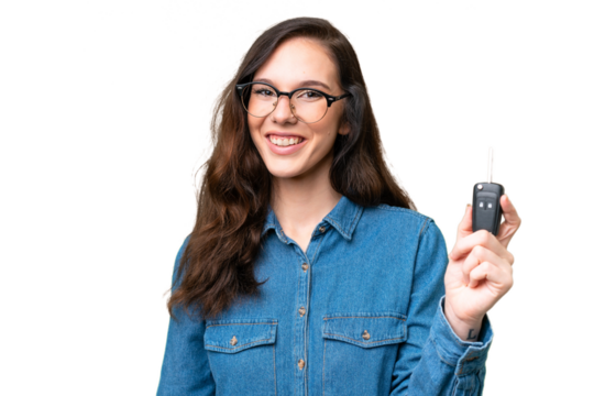 Young caucasian woman holding car keys over isolated background with happy expression - Powered by Adobe