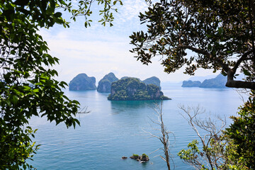 View through the jungle to the Andaman sea and tropical islands in Krabi province of Thailand