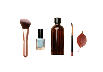 Flat lay of beauty products and a fall leaf, isolated on a transparent background.

