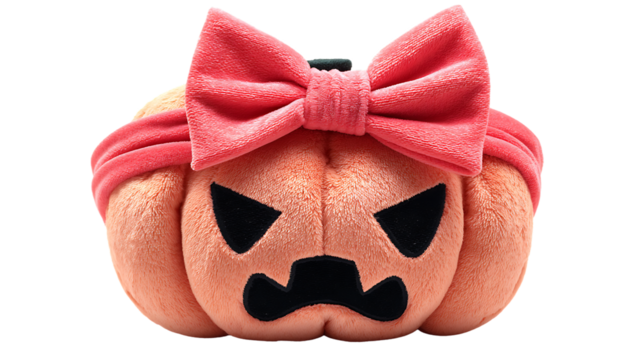 Cute plush pumpkin with angry face and pink bow isolated on white isolated on transparent background