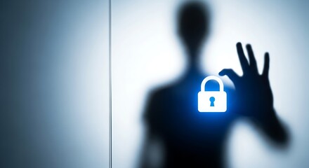 Silhouette of a person holding a glowing padlock symbol representing security and protection