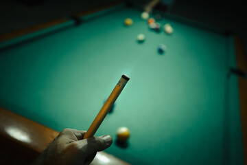 Playing pool in a night pub