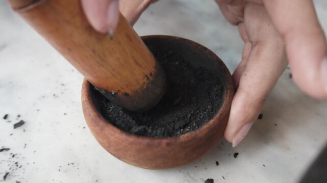 Charcoal made from natural wood, commonly used for cooking, grilling, and traditional energy sources.
