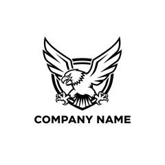 Obraz premium Fierce Eagle Mascot Logo with Spread Wings on a Shield.