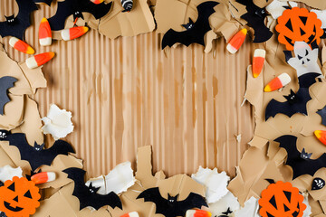 Halloween rustic cardboard frame with vintage pumpkins

