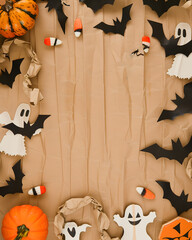 Vintage cardboard halloween frame with festive details

