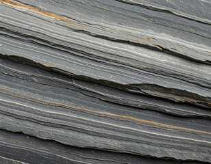 Macro Shot of Stacked Gray Industrial Material with Rough Edge and Abstract Pattern