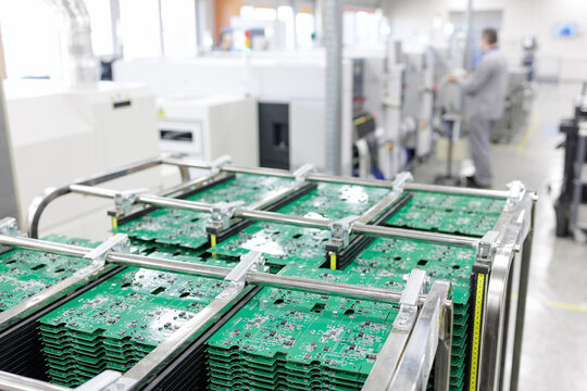 PCB panels in antistatic rack on high speed SMT assembly line