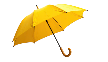 A bright yellow umbrella, angled, against a black background