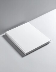 Blank White Hardcover Book Mockup on White Surface with Soft Shadow in Studio