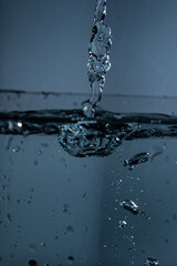 412.Water Droplets and Abstract Water Surface.