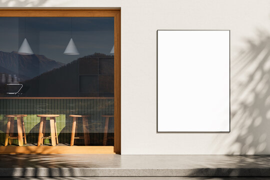 Modern cafe interior with wooden stools and large blank poster mockup on exterior white wall in daylight setting. 3D Rendering. 3D Rendering