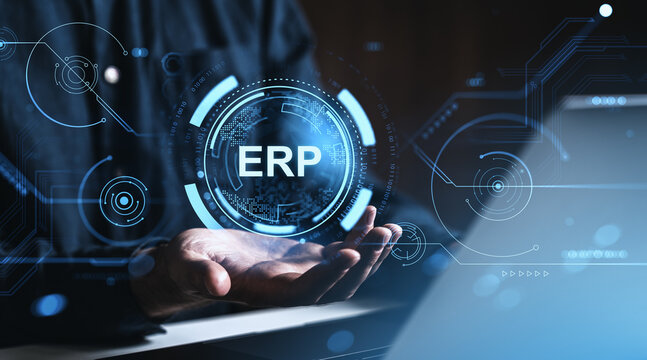ERP system interface concept with digital hologram over businessman's hands and futuristic HUD elements on dark background with blue tones. - Powered by Adobe