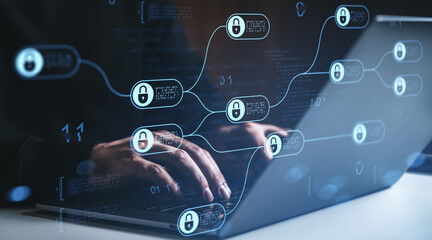 Cybersecurity data flow concept with hands typing on a laptop and digital padlock icons connected in a secure network interface on dark background.