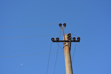 Overhead power line support with power lines, reinforced concrete poles with power lines, power...