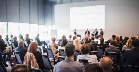 Interview and round table discussion at business convention and presentation. Audience at the conference hall. Business and entrepreneurship symposium. © kasto