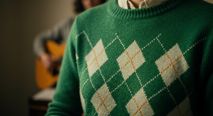 Green sweater with diamond pattern and collared shirt
