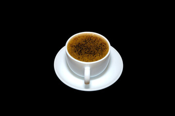 cup of coffee on black background closeup shot 