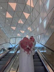 Two men leaving the underground station in Riyadh, Saudi Arabia