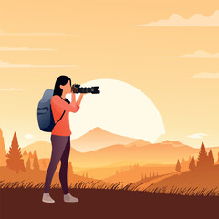 Woman photographer with backpack capturing sunset mountain landscape.