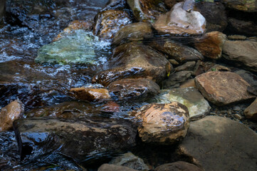 Clean river flowing between rocks, in Keelung city, Taiwan.