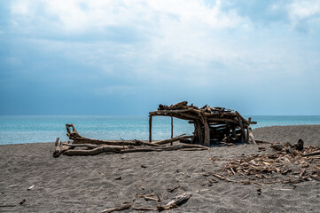 Lovely shelter made by woods standing in the beach, in Yilan, Taiwan.