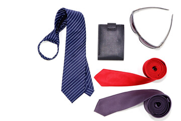 Necktie and other accessories together on white background close-up view, Male fashion accessories flat lay photography 