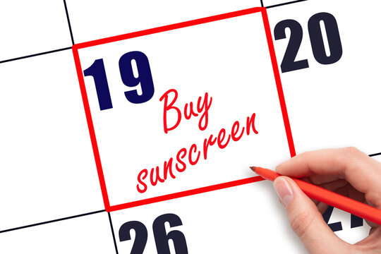 19 th day of the month. Hand writing Buy sunscreen reminder and drawing red frame on calendar. Concept skin care, health care. Travel planning concept. Planning and scheduling